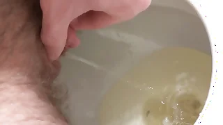 Stroking my ftm cock as I piss